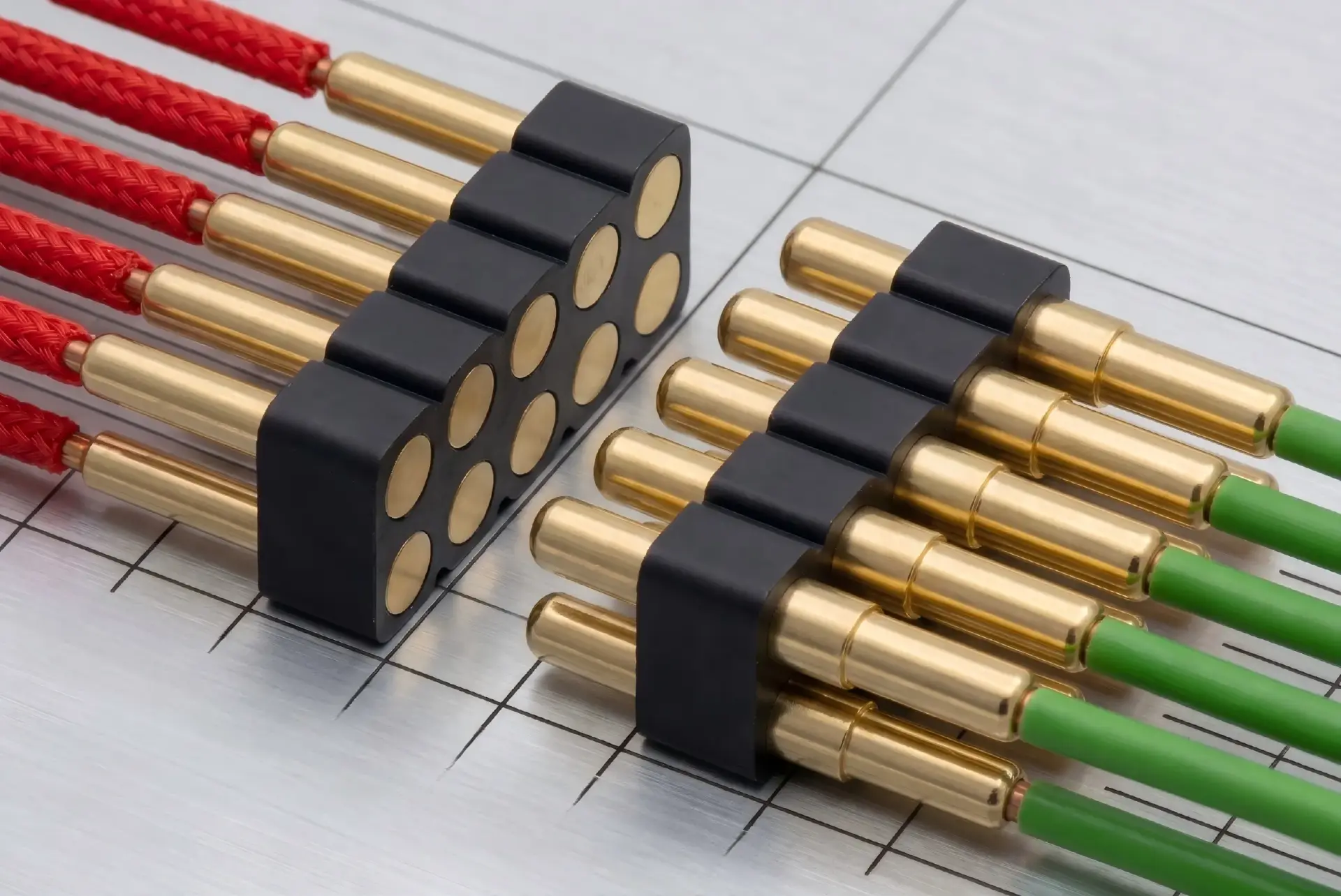 CTP robust wire termination spring probes featuring precision solder cups for 24 AWG wires and heavy-duty crimp barrels for 16 AWG.
