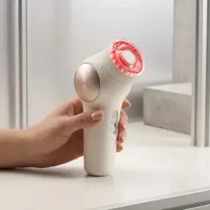 Magnetic charging cable interface for handheld beauty devices